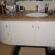 Mobile bagno in sagoma semiovale laccato lucido 