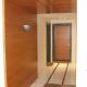 Rivestimento/boiserie in legno ciliegio su piaenerottolo condominiale
